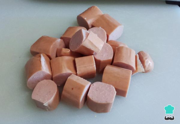 Saucisses mijotées à la tomate Recette - Étape 3