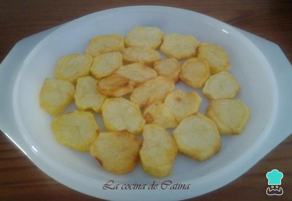 Recette de Merlu à l'eau-de-vie avec pommes de terre - Étape 1
