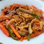 Recette Pad Thai au poulet et légumes : pour préparer facilement le célèbre plat thaïlandais à la maison