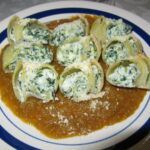 Recette de Coquilles farcies aux épinards et au fromage